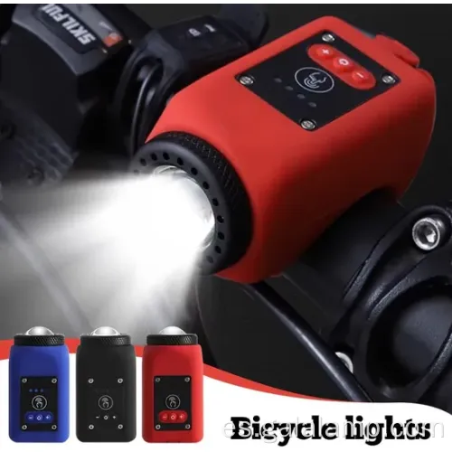 Luz de bicicleta colocada con bocina y carga USB